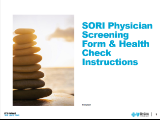 Flat stones stacked on a beach on a the cover of an instruction guide